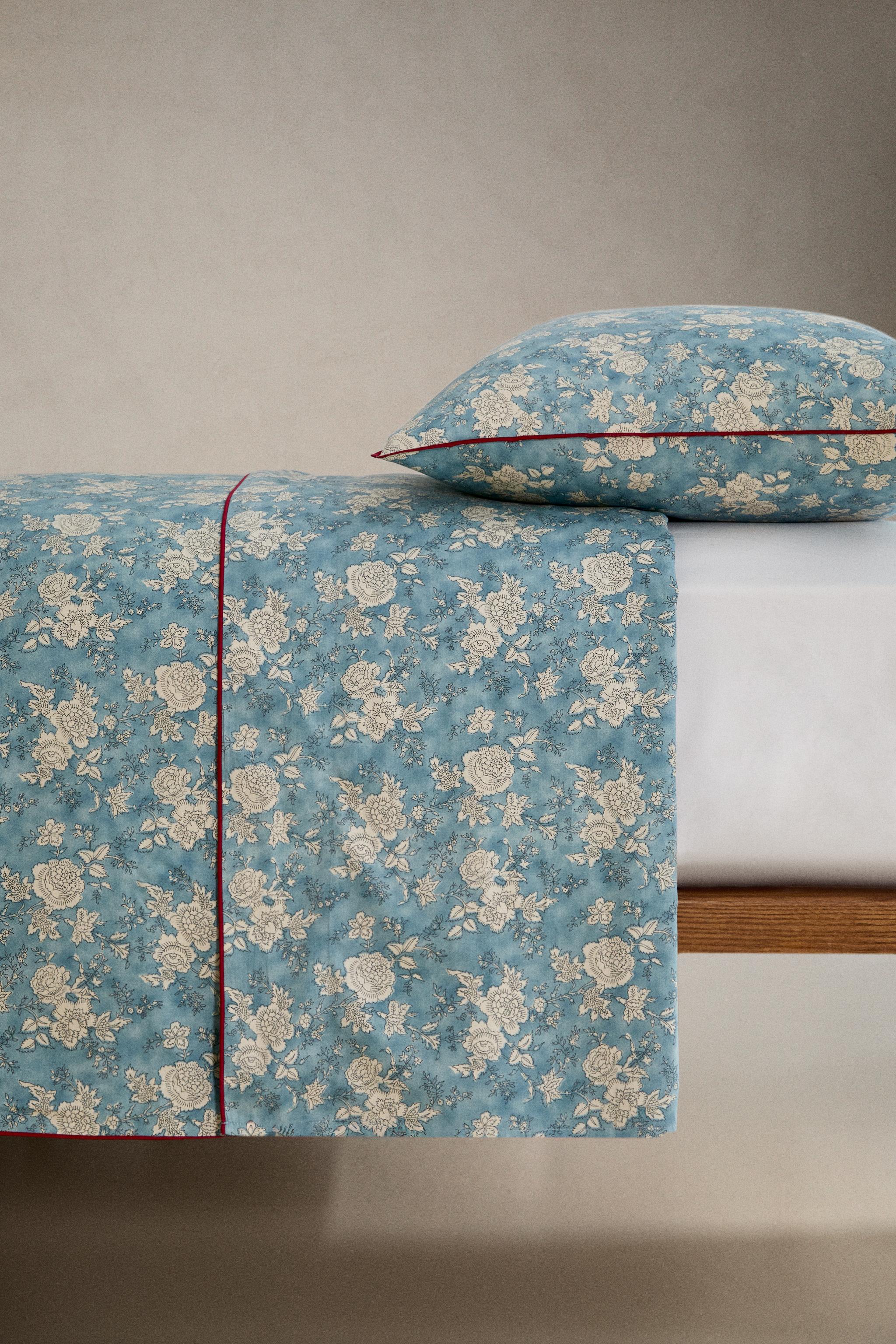 HOUSSE DE COUETTE SATIN FLEURS PASSEPOIL